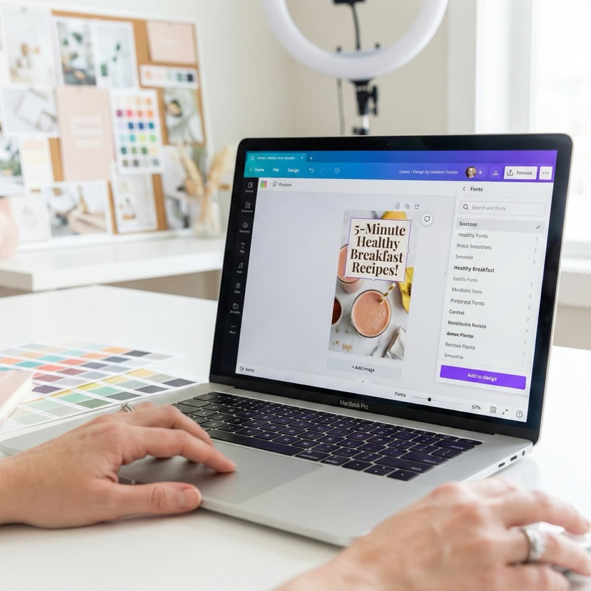 A laptop screen showing a work for Pin Design & Creation in a home office