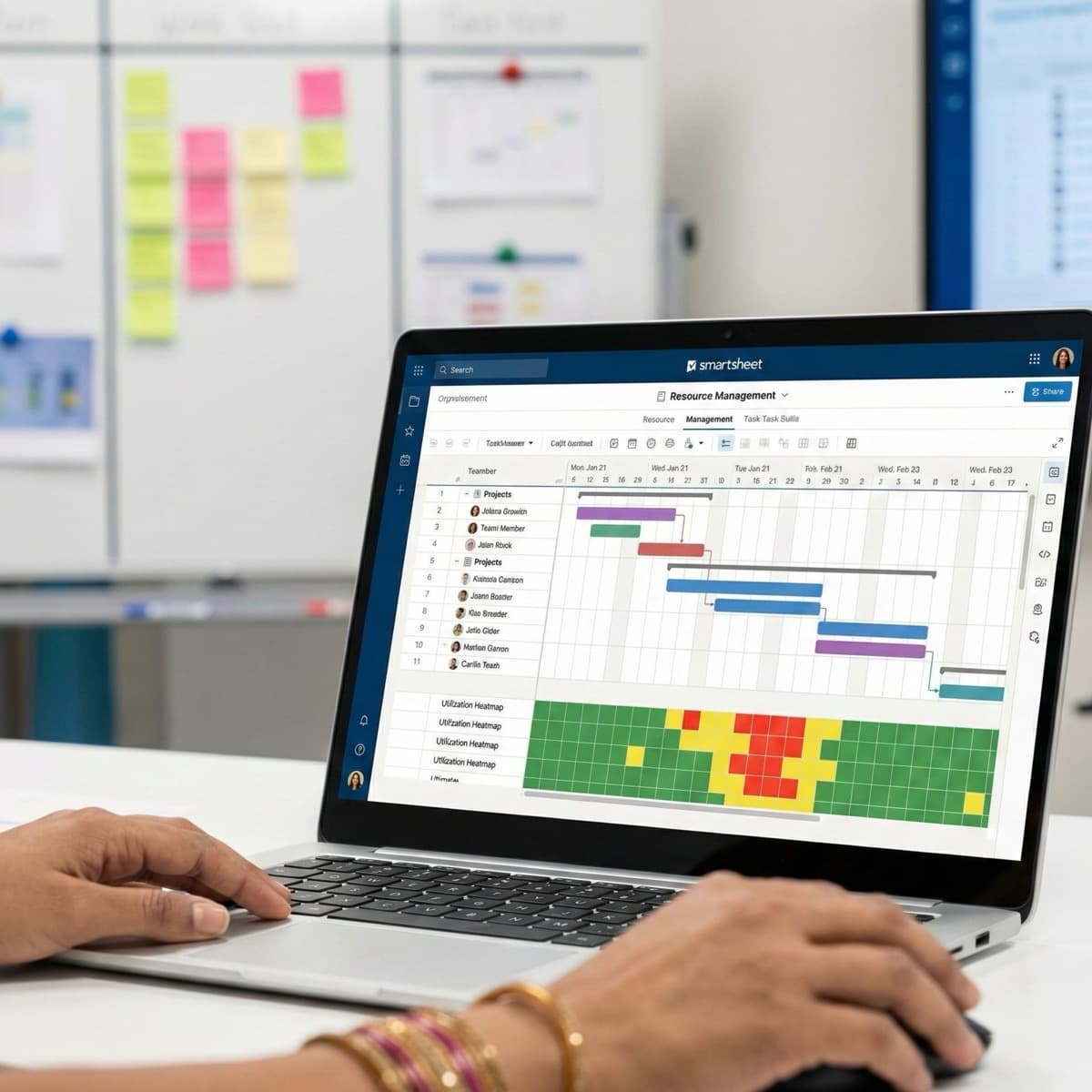 A laptop screen showing a work for Resource Allocation in a home office